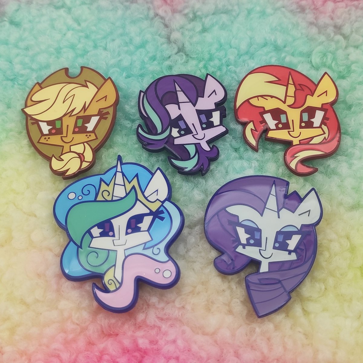 spacekitsch's tweet photo. missing any sold out pin designs from me? i'm finally doing a seconds grade pin sale again - there's a small amount of my Starry Night luna pins, Trixie pins, and earliest headshot pin designs left. + random stuff off my con displays. sticker sets + regular pins are 15% off https://t.co/A5YnkvAB5t