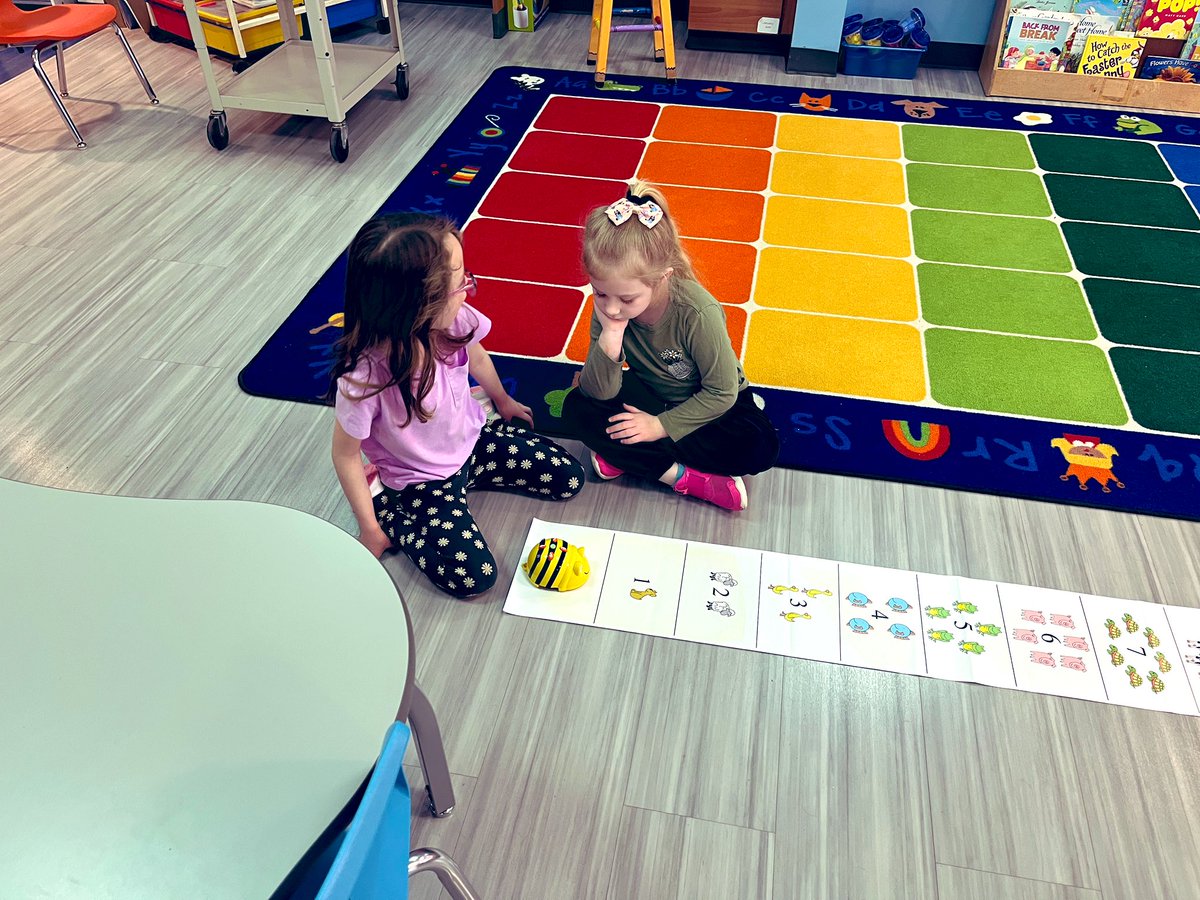 techiepusher's tweet image. The Queen Bee and her worker bees learning to code with the Bee-Bots! #robots #coding #ESMEdTech