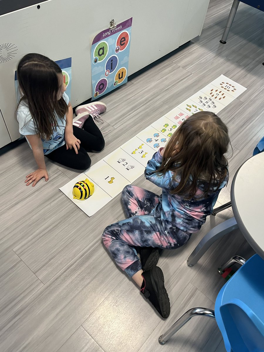 techiepusher's tweet image. The Queen Bee and her worker bees learning to code with the Bee-Bots! #robots #coding #ESMEdTech