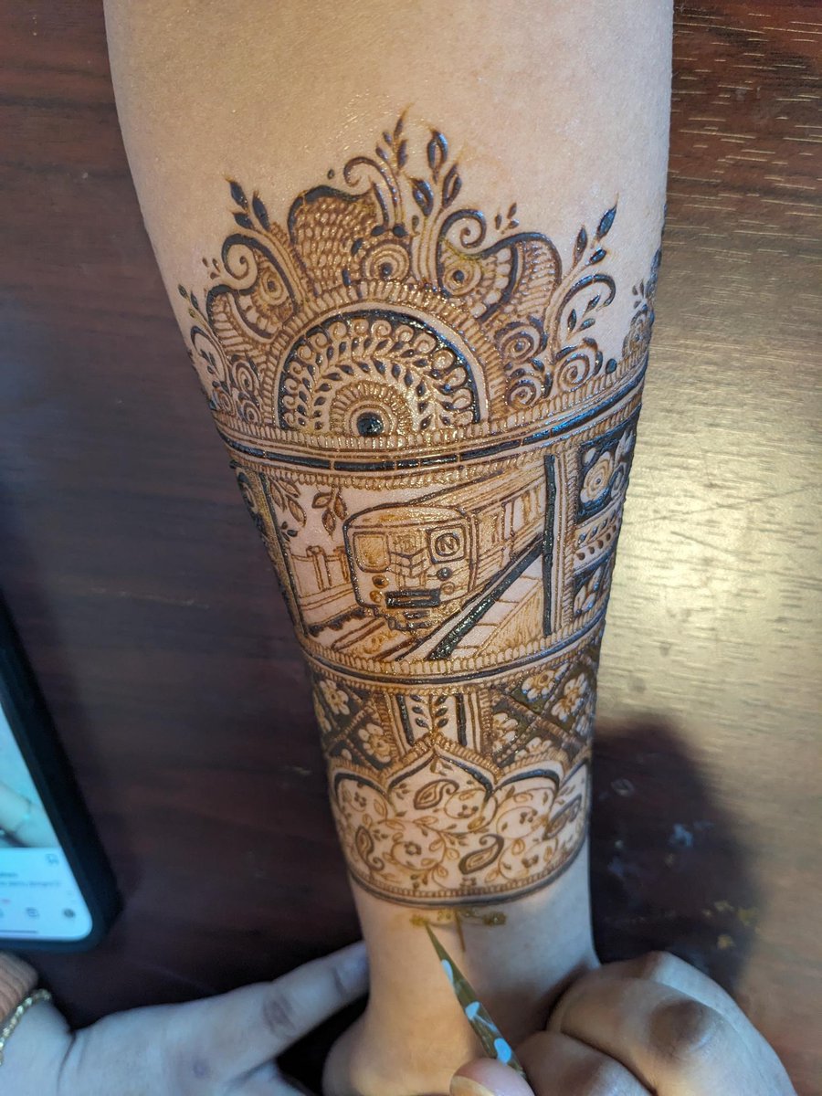 timeline cleanse: my friend having a wedding saturday and the artist wove in an N train into her arm mehendi