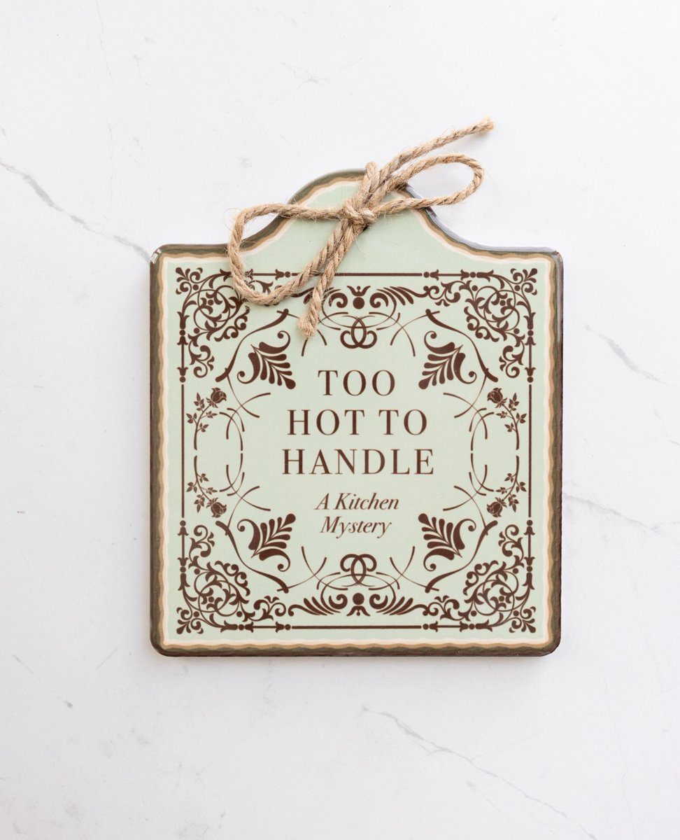 OUABookClub's tweet image. Experience a kitchen mystery with this next item from the Spring Boutique Collection - a ceramic trivet! This trivet measures 7.5" x 6.5" and will launch at $25. Don't forget - our Spring 2025 Boutique launch is happening this Friday, April 11th at 10am PT (1pm ET)! #OUABC