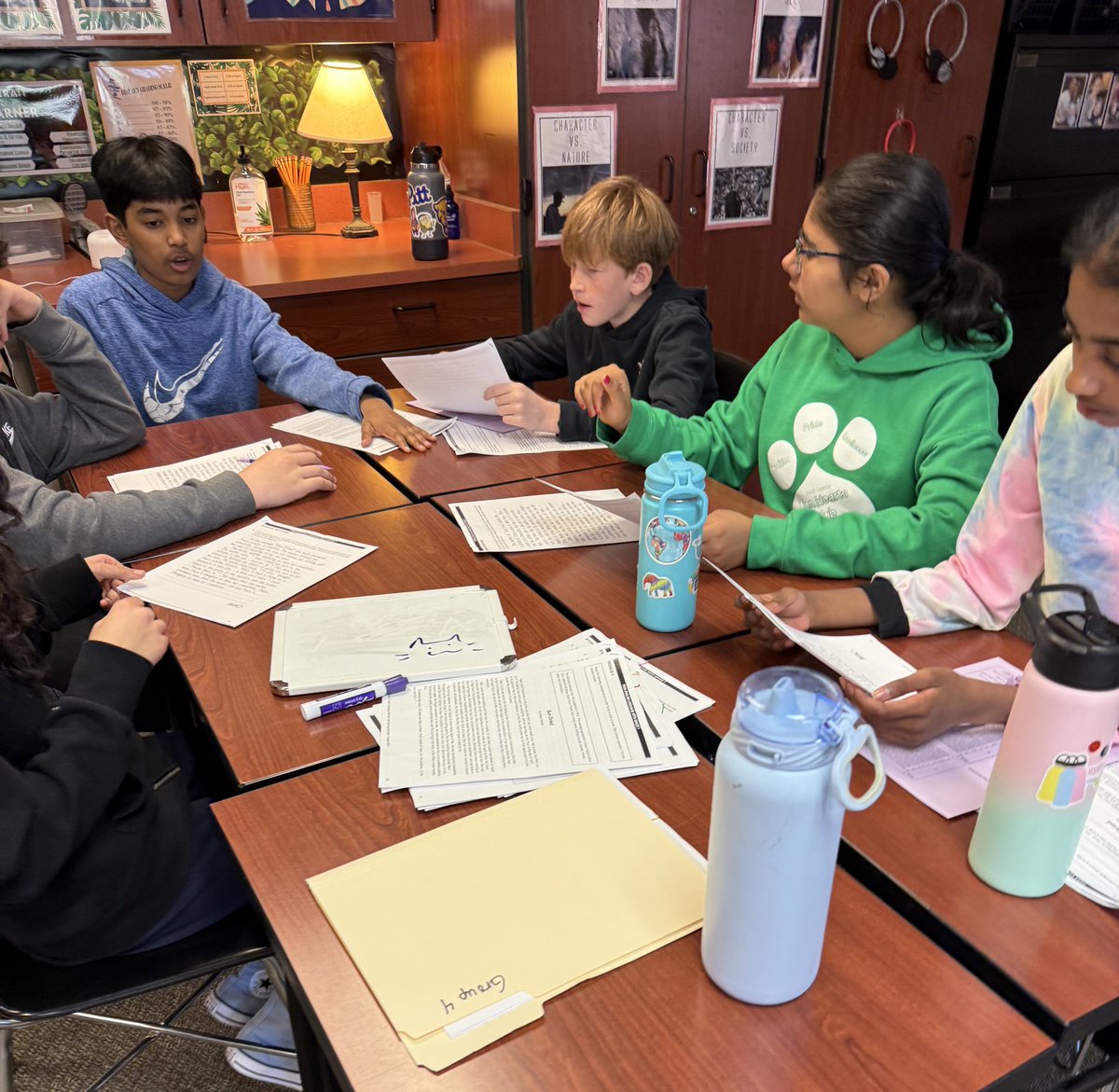 Collaborative critics in action!
 ELA 7 students are working in groups to read and rank TDA essays—learning from peers to level up their own writing! #StudentCenteredLearning #ELA7 #WritingGrowth <a href="/SFMSLions/">South Fayette Middle School</a>