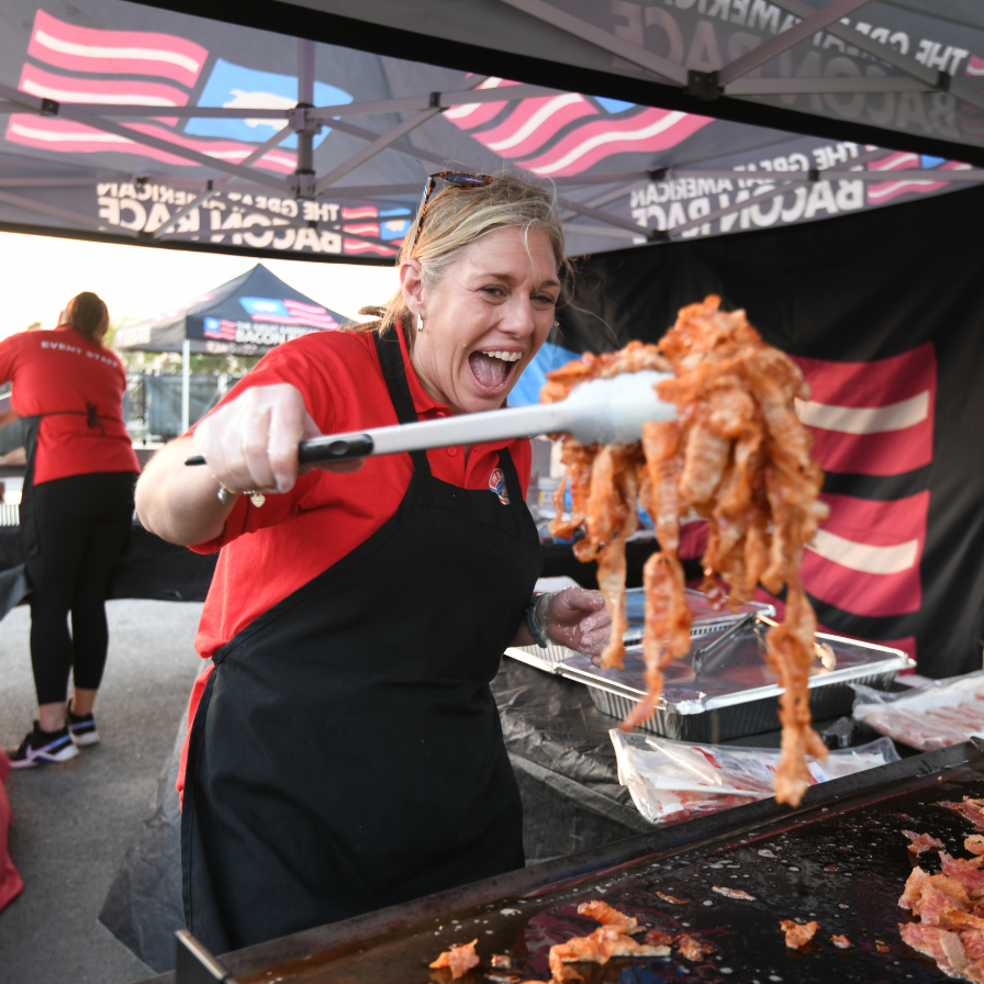 theBaconRace's tweet photo. Amanda, one of our core team members, here getting the good stuff ready for the race finishers. https://t.co/R3uptvPeyK