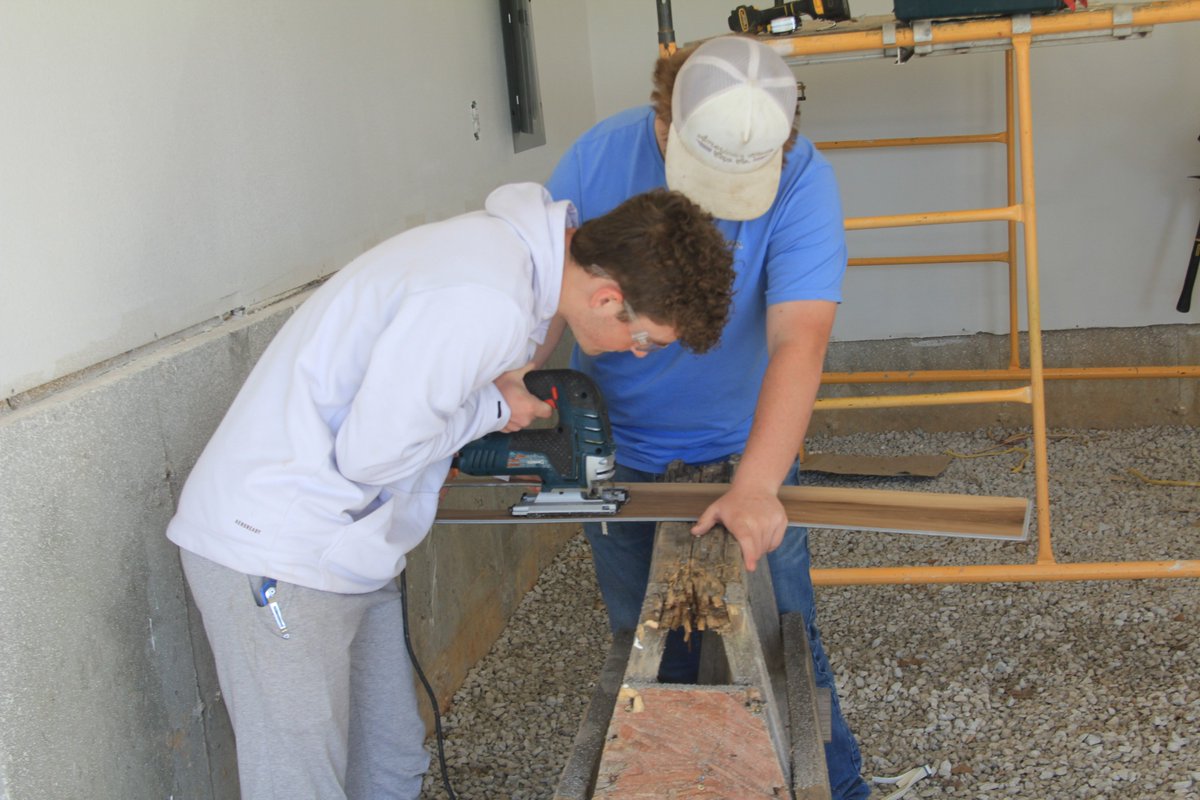 We have been very busy the last month; painting, permanent electric, electric trim-out (all circuits functioning), hanging int. doors, flooring, baseboard. It's full speed ahead and a whirlwind as we head into the last 6 weeks of school.