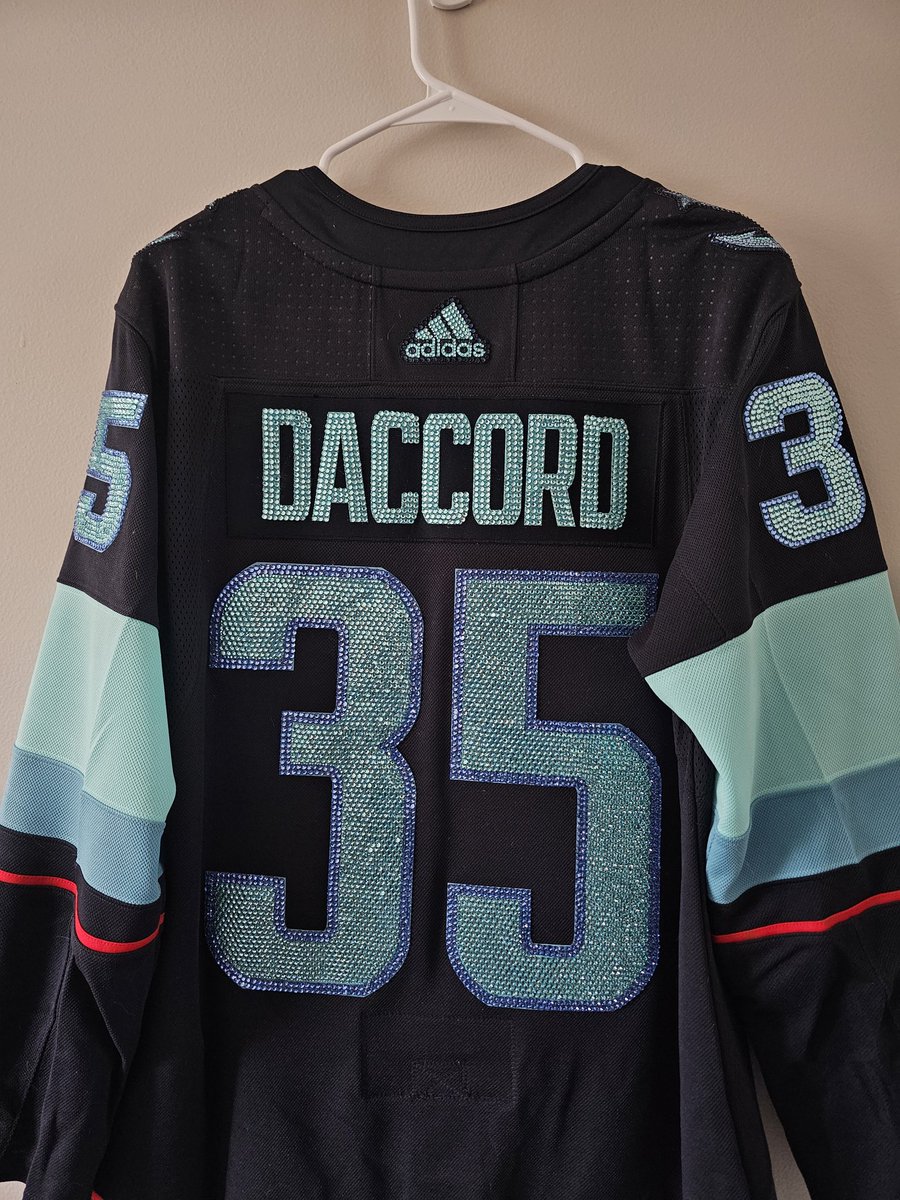 Mallory1616's tweet photo. 6 days later, and the Bedazzled @JDac35 jersey is done! I absolutely love it!🩵  #Seakraken     #NHL #Hockey #Sparkly https://t.co/KTh8Nm8vnA