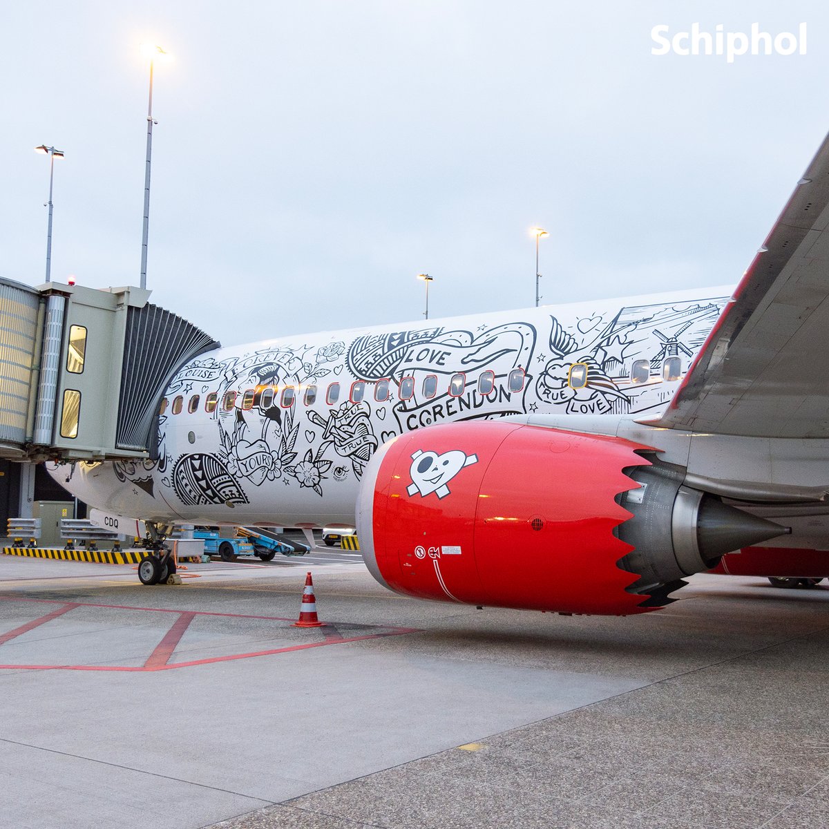 Schiphol's tweet photo. Did you say 'fully tattooed plane?' @corendon's 25th anniversary livery just took to the skies for the first time from Schiphol – and instantly made the sky a whole lot cooler 🤩 https://t.co/RkuvL6V3yL