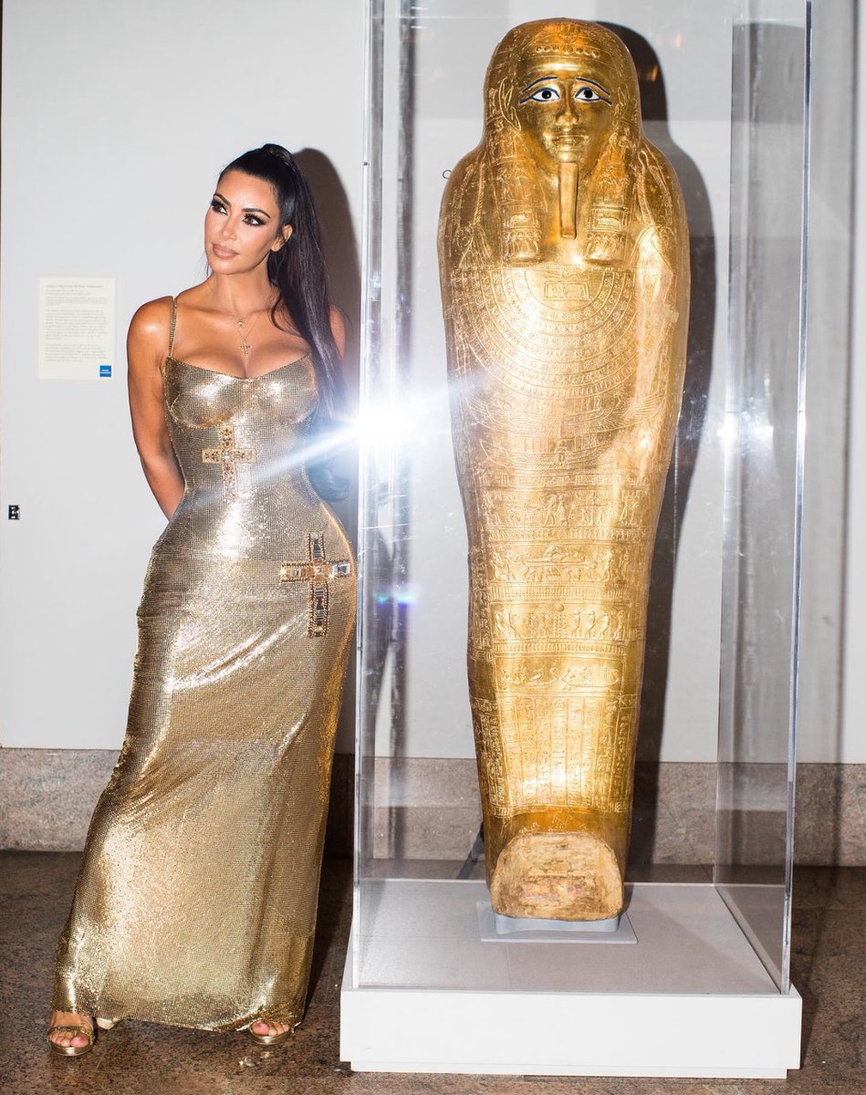 churchofysl's tweet photo. fun fact: this photo of Kim Kardashian at the 2018 met gala alerted Egyptian officials to the location of the missing sarcophagus of nedjemankh. it was looted during the 2011 Egyptian revolution. it was then returned to the grand Egyptian museum in Cairo in 2019! https://t.co/ndRGC7lkoU