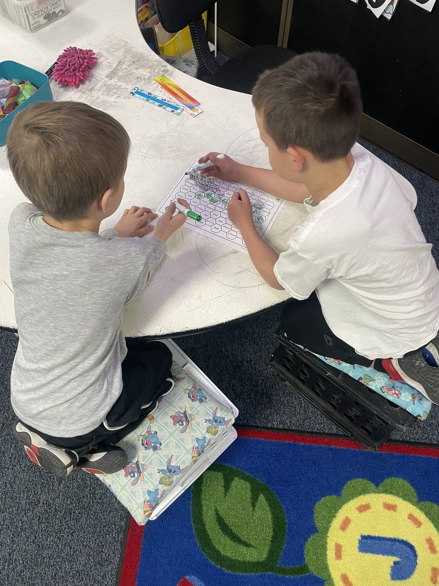 MrsSwallowsRoom's tweet photo. We are busy bees this morning! We got with partners and tried to find a way from one end of the hive to the other while working on our ew, ui, and ue sounds! #firstgrade #mcscbears https://t.co/tUzR7JnsPy