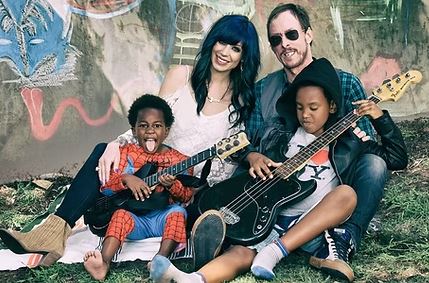 NatCon2022's tweet photo. Former prostitute turned author and adoption advocate Jillian Lauren, wife of Weezer bassist Scott Shriner, shot by police in front of her house.

Suffered only minor injuries. Cops allege she pointed a gun at them after fleeing on foot from a hit and run. https://t.co/jSgjof8IvV
