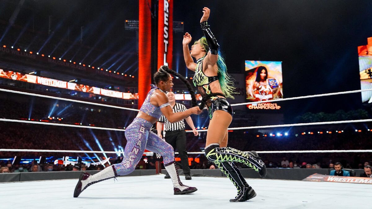 WrestleOps's tweet photo. 4 years ago today, Sasha Banks and Bianca Belair made history by becoming the first Black wrestlers to main event #WrestleMania against each other. https://t.co/xh87FzijMF