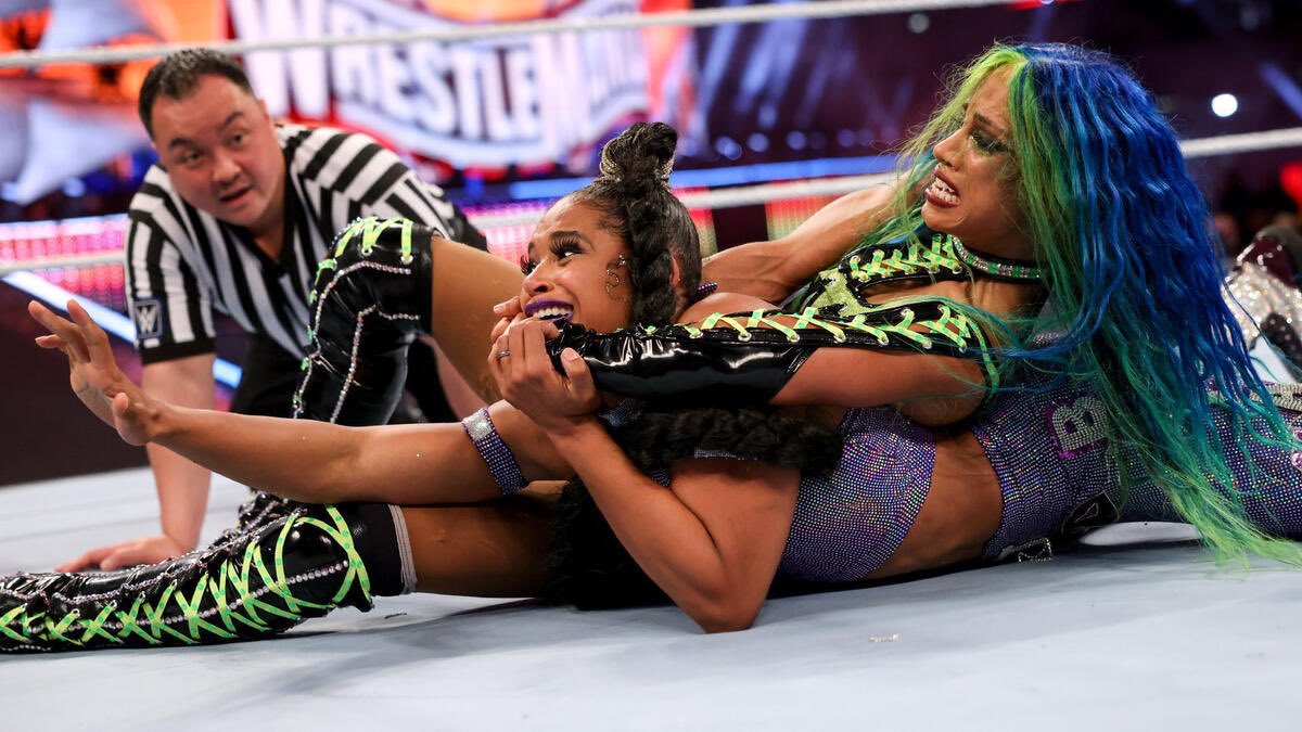 WrestleOps's tweet photo. 4 years ago today, Sasha Banks and Bianca Belair made history by becoming the first Black wrestlers to main event #WrestleMania against each other. https://t.co/xh87FzijMF