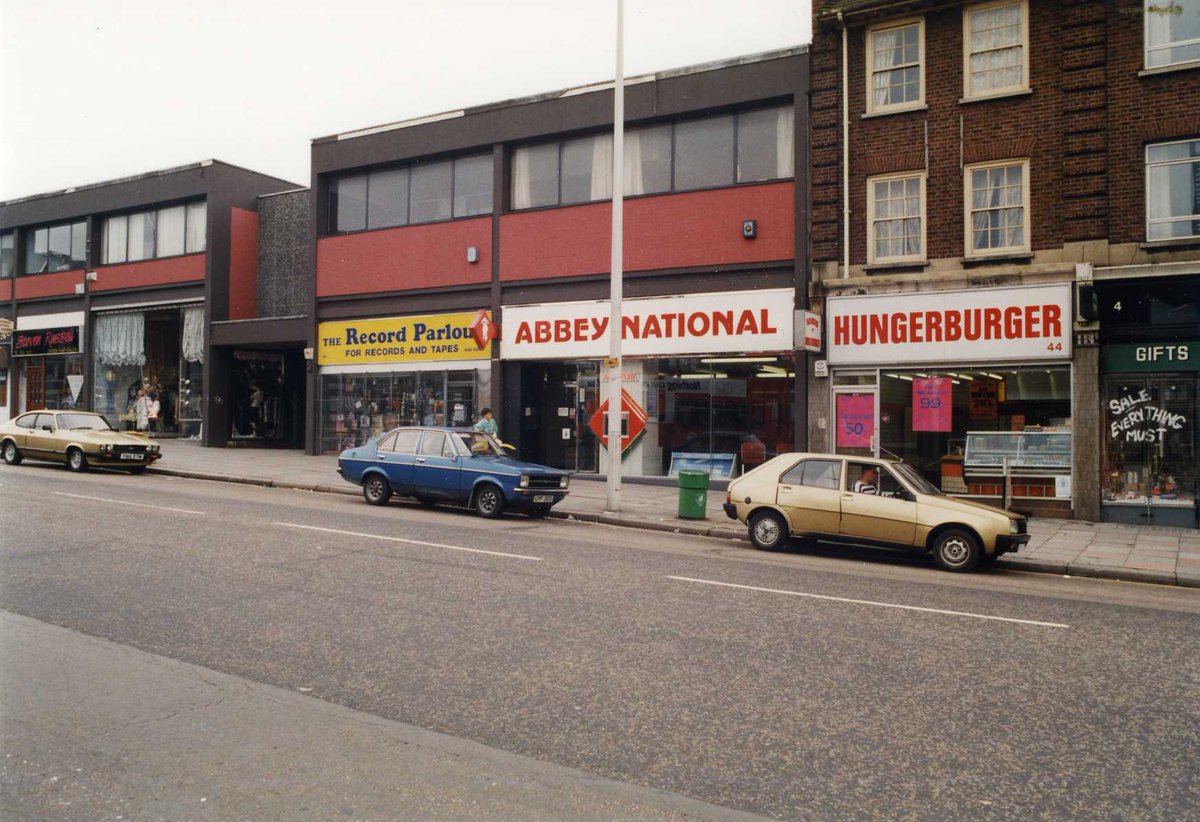 Valence House (@valencehouse) on Twitter photo It's #RecordStoreDay so a real blast from the past. This parade of shops was demolished to make way for <a href="/Vicarage_Field/">VicarageField</a>. If you carried on over the hill you could also check out Guy Norris, you might have met <a href="/billybragg/">Billy Bragg</a>
(and how many lads dreamed of owning a gold Capri!) It's #RecordStoreDay so a real blast from the past. This parade of shops was demolished to make way for <a href="/Vicarage_Field/">VicarageField</a>. If you carried on over the hill you could also check out Guy Norris, you might have met <a href="/billybragg/">Billy Bragg</a>
(and how many lads dreamed of owning a gold Capri!)