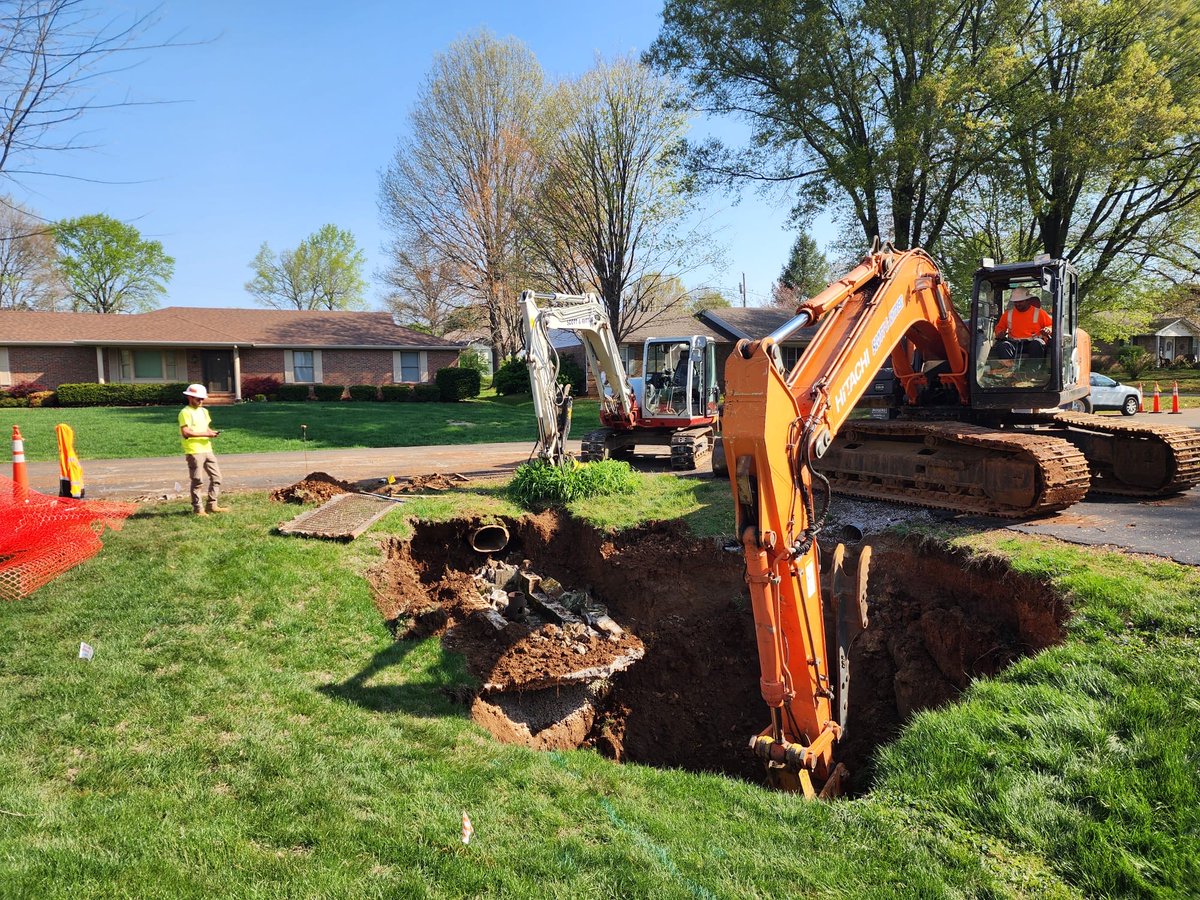 CityofBGKY's tweet photo. Normandy Way Sinkhole repair is underway. We are working hard to make infrastructure repairs following the flood. https://t.co/4rJr2v97eh