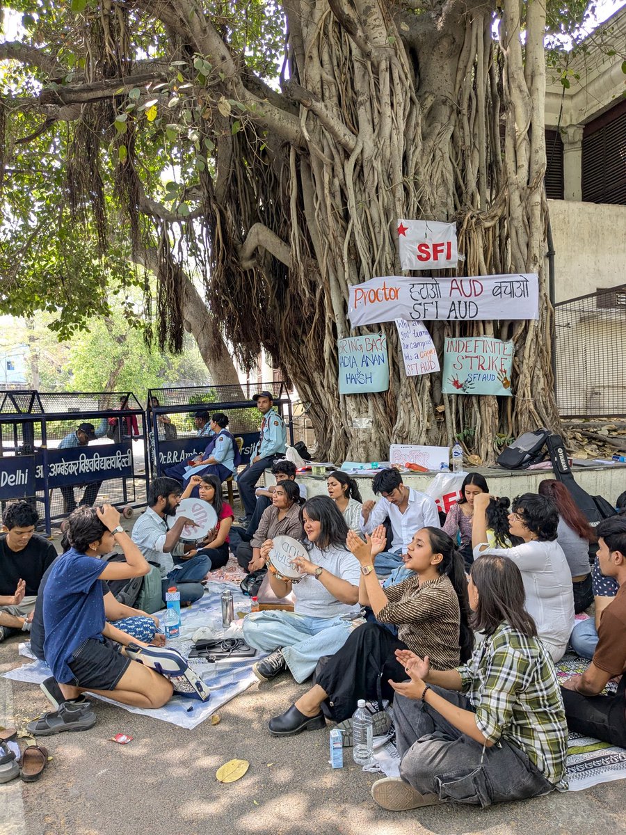 Nancymourya3's tweet photo. 96 hours of protest. Now an indefinite hunger strike.
 Sharanya (AUD student Union leader) &amp; Shefali (SFI Secretary) have pledged to neither eat nor drink until suspensions are revoked. Their bodies are at risk. Their courage is unmatched.
#SaveAUD
 @PTI_News @ndtv @the_hindu https://t.co/PgMVtu4mYW