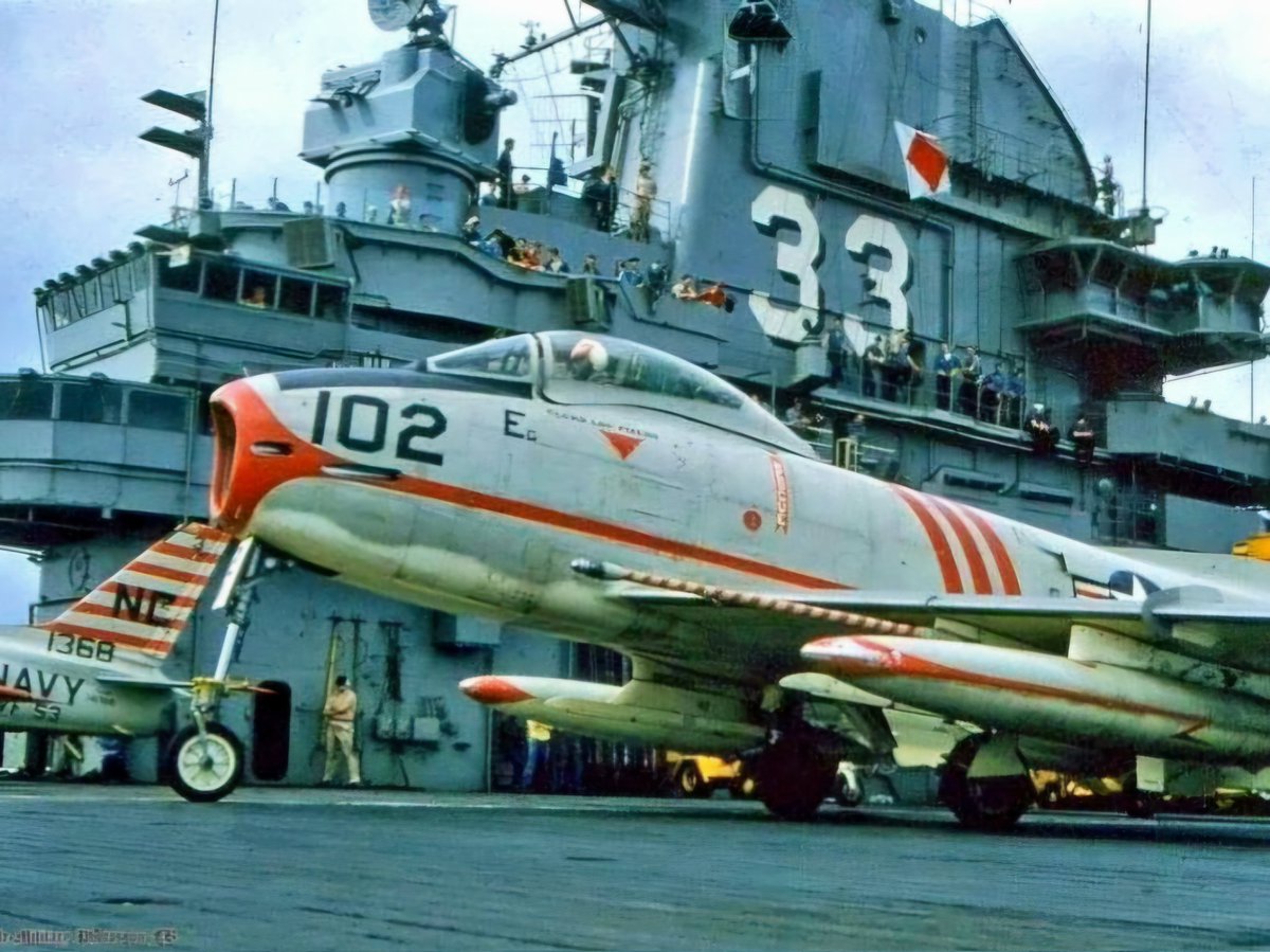 RealAirPower1's tweet photo. An FJ-3 from VF-53 "Black Knights" aboard USS Kearsage (CV -33) during its first post modernization cruise (Circa 1957). Notice the rather delicate forward landing gear? https://t.co/wxmyRzFlfc
