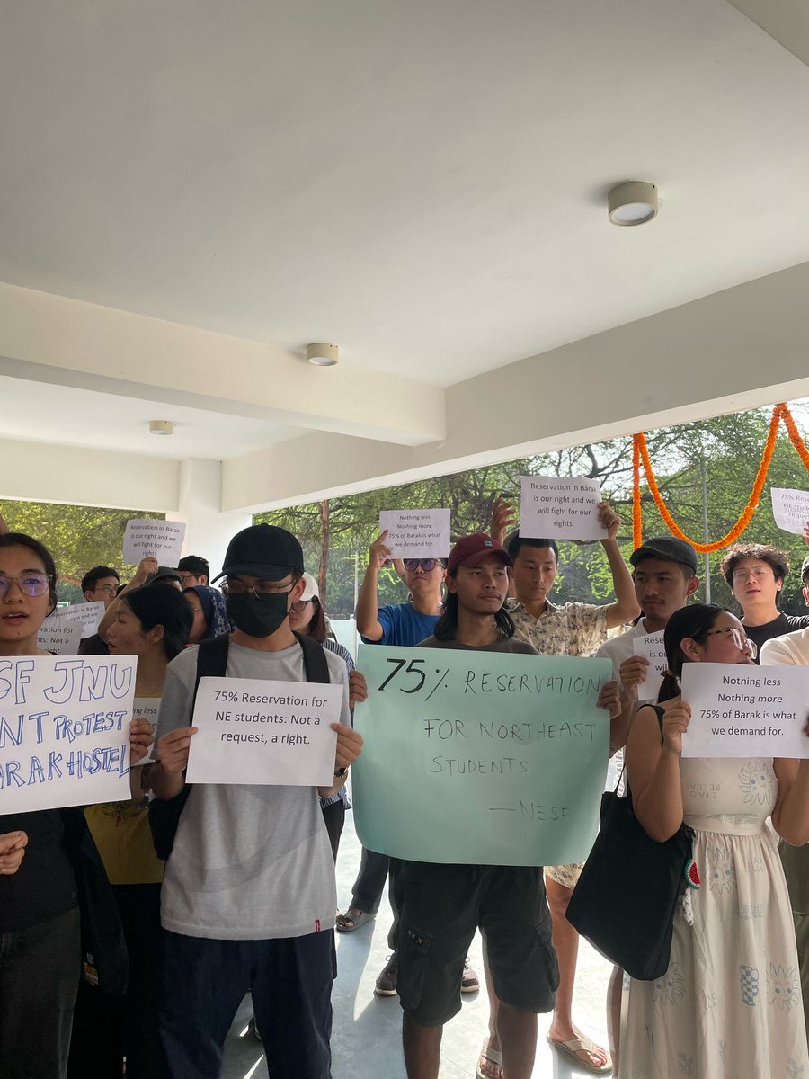NESF_JNU's tweet photo. A silent protest was organised by the North East Students’ Forum (NESF) during the inauguration ceremony of Barak Hostel, on 7th April 2025, Monday. 
A protest against the JNU Admin's blatant refusal of 75% reservation for the students of the NER. https://t.co/sSCHvENxdY