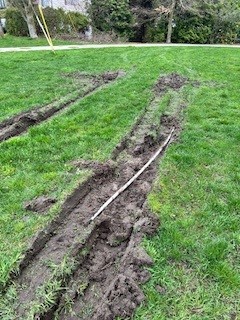 A_Reynolds's tweet photo. Significant tire damage and exposed pipes were left at Wall and Renfrew Park following @bchydro repairs. It has also been nearly two years since a vehicle destroyed the fence by the train tracks. @CityofVancouver, when will these safety issues be addressed? https://t.co/ln532TtoOX