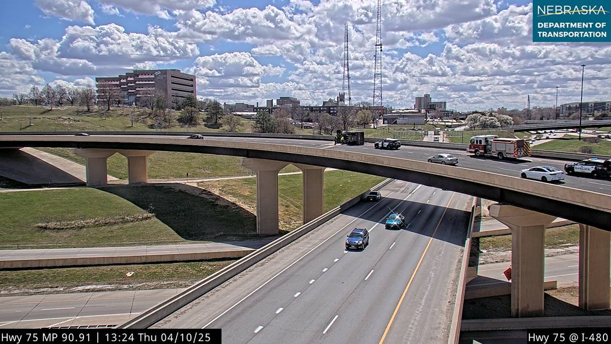 Injury Accident: North Freeway to Cuming Street Ramp
Dump truck has rolled over on the curve. 
OFD: E5 M5
Time Out: 13:03