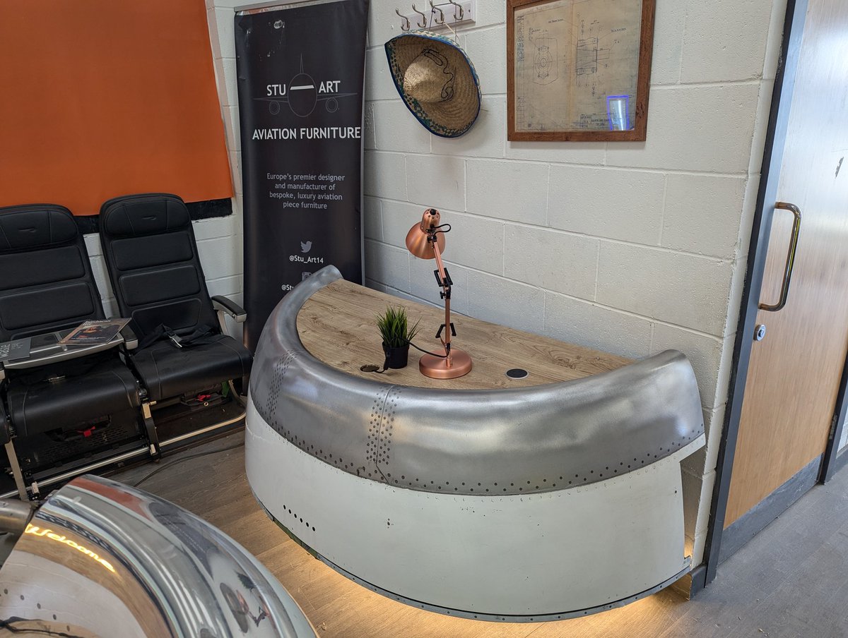 So today, I wirelessly charged my phone on a desk that used to be an <a href="/Airbus/">Airbus</a> A320 series engine intake. 

As you do.