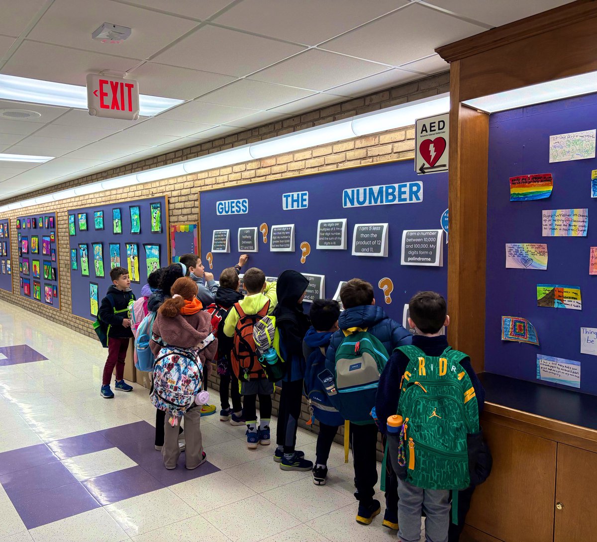 elona_coku's tweet photo. Ms. Plate did it again! She’s stopping traffic in the halls every morning with her amazing interactive math bulletin boards. The kids can’t get enough—learning and fun all in one spot! #MathMagic #WOSchool #WeAreChapaqua https://t.co/v6tDhoXyz4