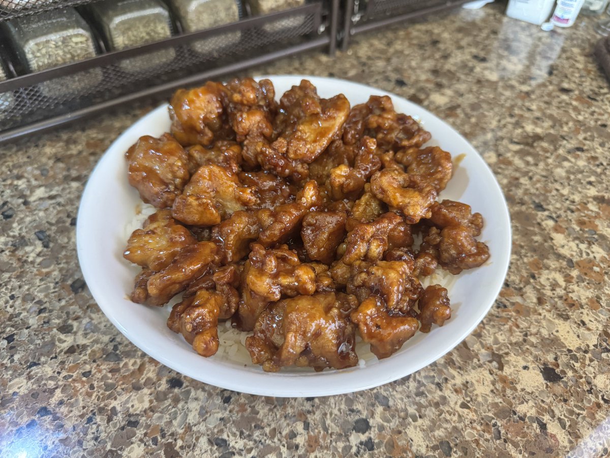 BowTiedHRT's tweet photo. Trader Joe’s orange chicken 
is absolutely delicious. Five dollars for 105 g of protein. It’s got a lot of fat macros in it so if you’re on the lookout for that it’s not your best bet.

Add a little bit of Secret Aardvark hot sauce and some Teriyaki to the sauce that comes with it to make it taste like your favorite Chinese take out place.