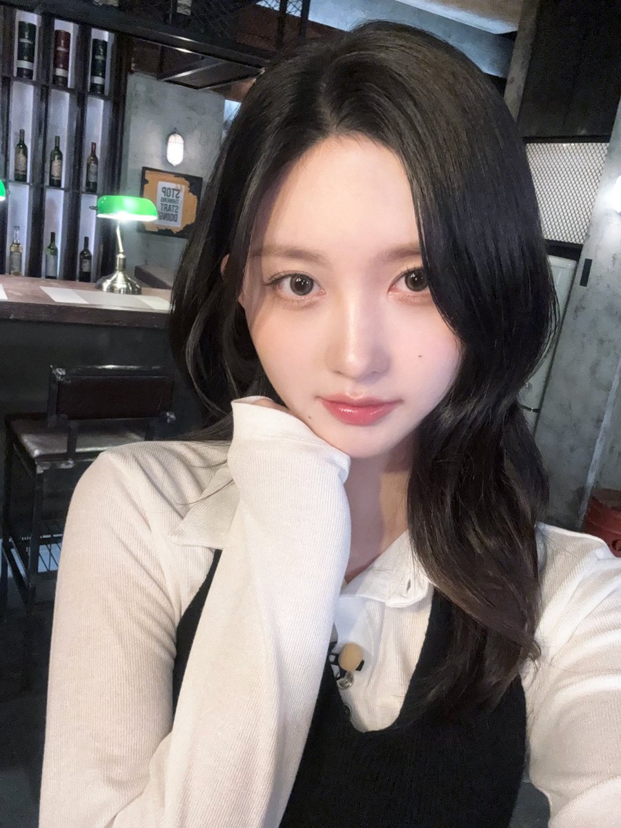 Sipping serenity in soft whites and cozy vibes.