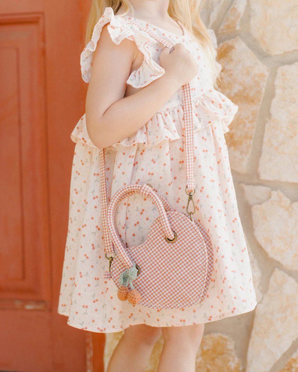 HiBubbeleh's tweet photo. All heart eyes for this poppy gingham heart purse.😍 The must-have accessory for spring and summer! Its charming shape and just-right size make it perfect for playdates, park days, and dress-up fun. 🌸

Shop here: https://t.co/TvqEfDhGKi

#ToddlerGirl #GirlFashion #GirlStyle https://t.co/D9SUI77oqc