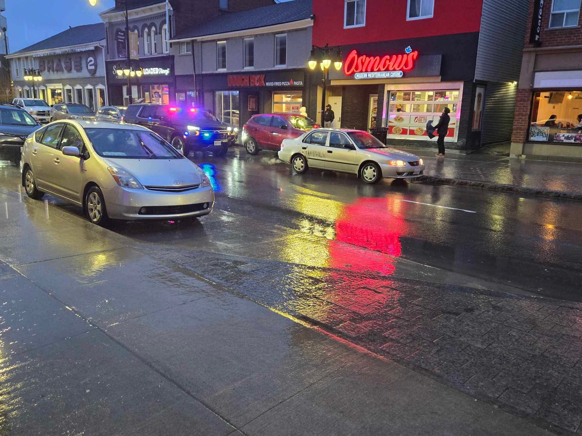MIHomeYGK's tweet photo. Kingston Police reminding some drivers that Princess St lanes aren’t parking spaces… https://t.co/GQbrl8q5EM