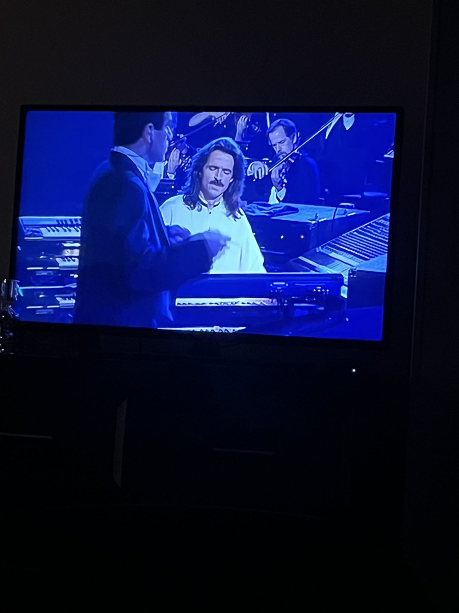 Watching Yanni on YouTube. 

That guy is incredibly talented!