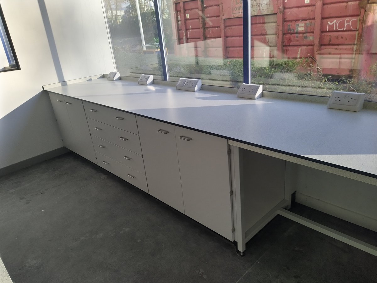 new_lab's tweet photo. A custom lab refit designed and manufactured in-house and installed by our team for our client Tenmat - including fixed cupboards and drawers with a Trespa worktop, and epoxy sinks.

#LabTable
#MadeInBritain
#MadeInYorkshire
#EnablingScience
#Trespa
#LabFurniture
#LabSinks https://t.co/yoQ0U4V7D9