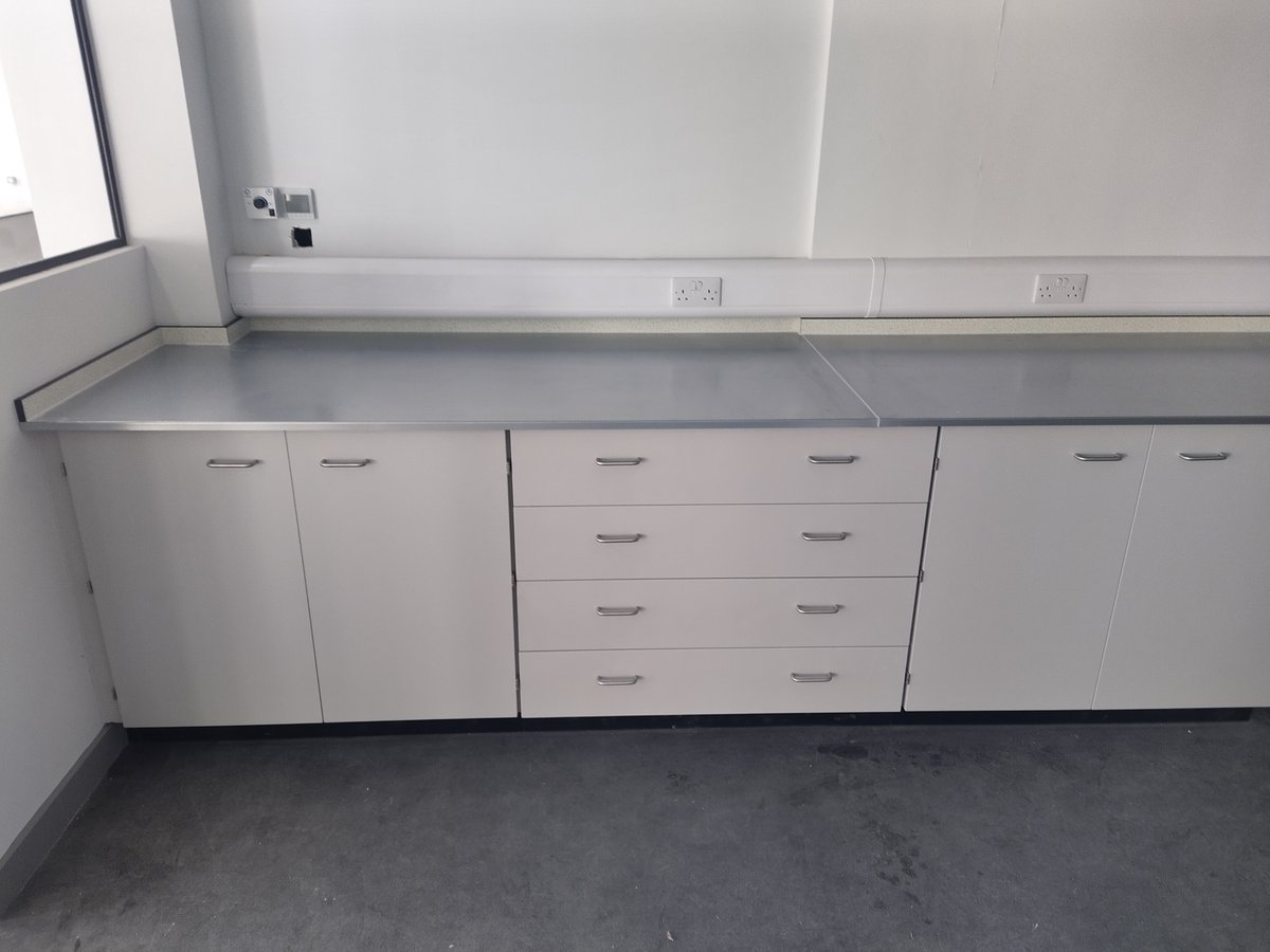 new_lab's tweet photo. A custom lab refit designed and manufactured in-house and installed by our team for our client Tenmat - including fixed cupboards and drawers with a Trespa worktop, and epoxy sinks.

#LabTable
#MadeInBritain
#MadeInYorkshire
#EnablingScience
#Trespa
#LabFurniture
#LabSinks https://t.co/yoQ0U4V7D9