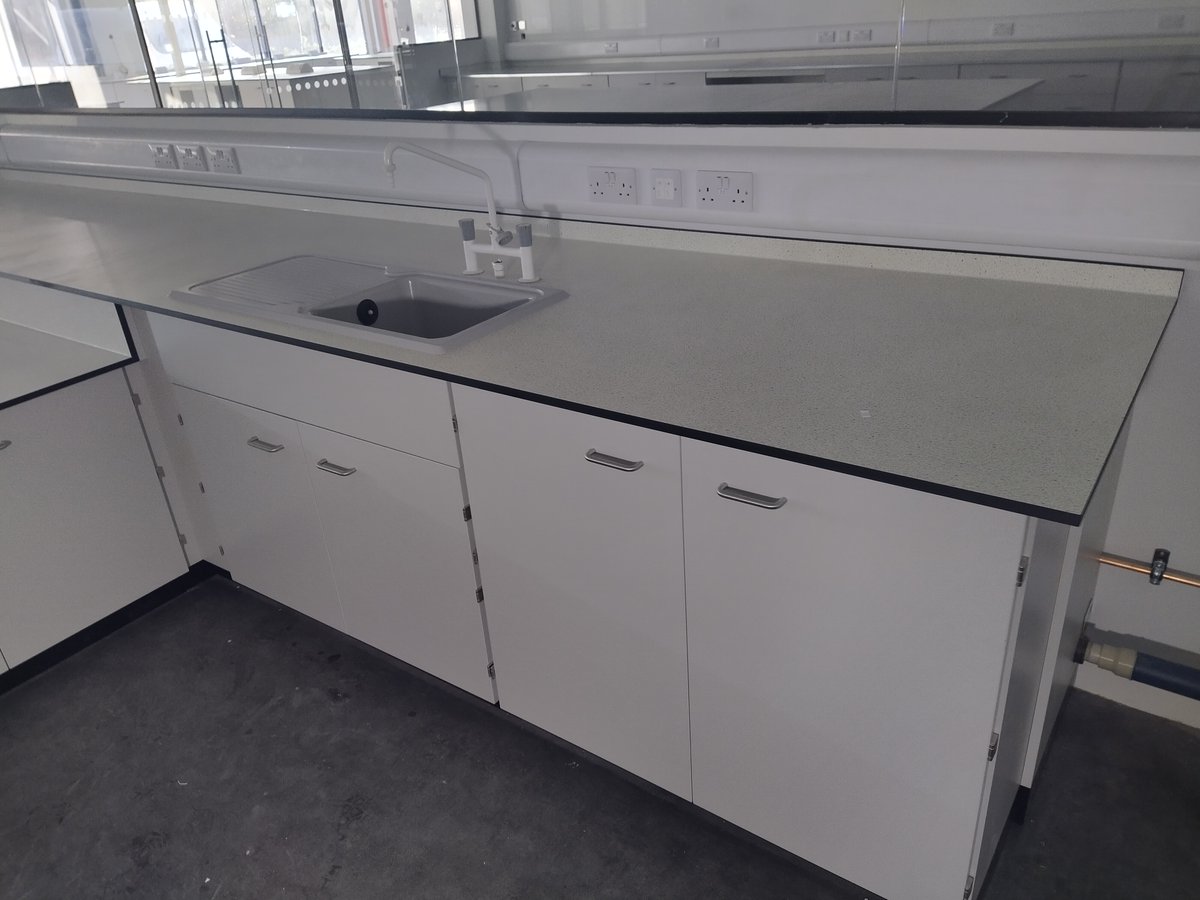 new_lab's tweet photo. A custom lab refit designed and manufactured in-house and installed by our team for our client Tenmat - including fixed cupboards and drawers with a Trespa worktop, and epoxy sinks.

#LabTable
#MadeInBritain
#MadeInYorkshire
#EnablingScience
#Trespa
#LabFurniture
#LabSinks https://t.co/yoQ0U4V7D9