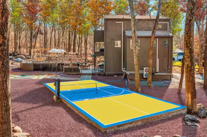 AdvntureCapital's tweet photo. This Poconos property just got a major backyard glow-up! ✨ Pickleball + basketball court, pool &amp; deck, fire pit, jungle gym, bowling, mini golf, cornhole &amp; hot tub — it’s a full-on resort at home! 

#PoconosLiving #OutdoorOasis #BackyardGoals #PoolsideVibes #DreamBackyard https://t.co/heNAUygSIZ