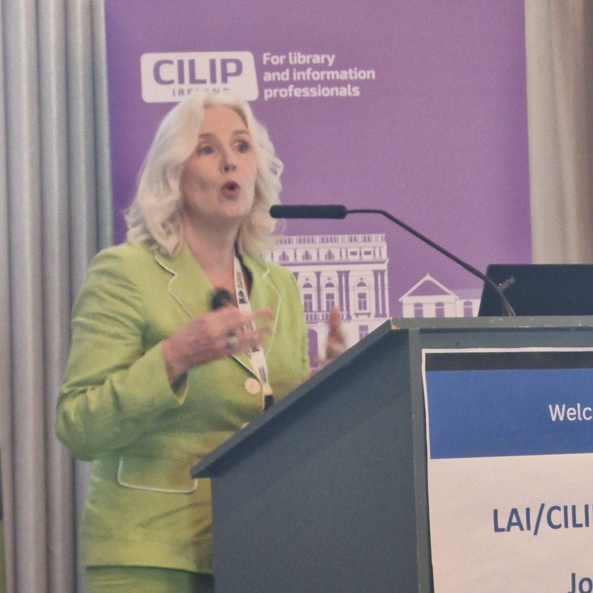 LAIonline's tweet photo. Gillian Kelleher from Cork County Council library service discussing Millstreet Library's Age Friendly Group, that combats social isolation in older people and improves community connections and well-being.  

#LAICILIPIRE25 https://t.co/yZrUep72wZ