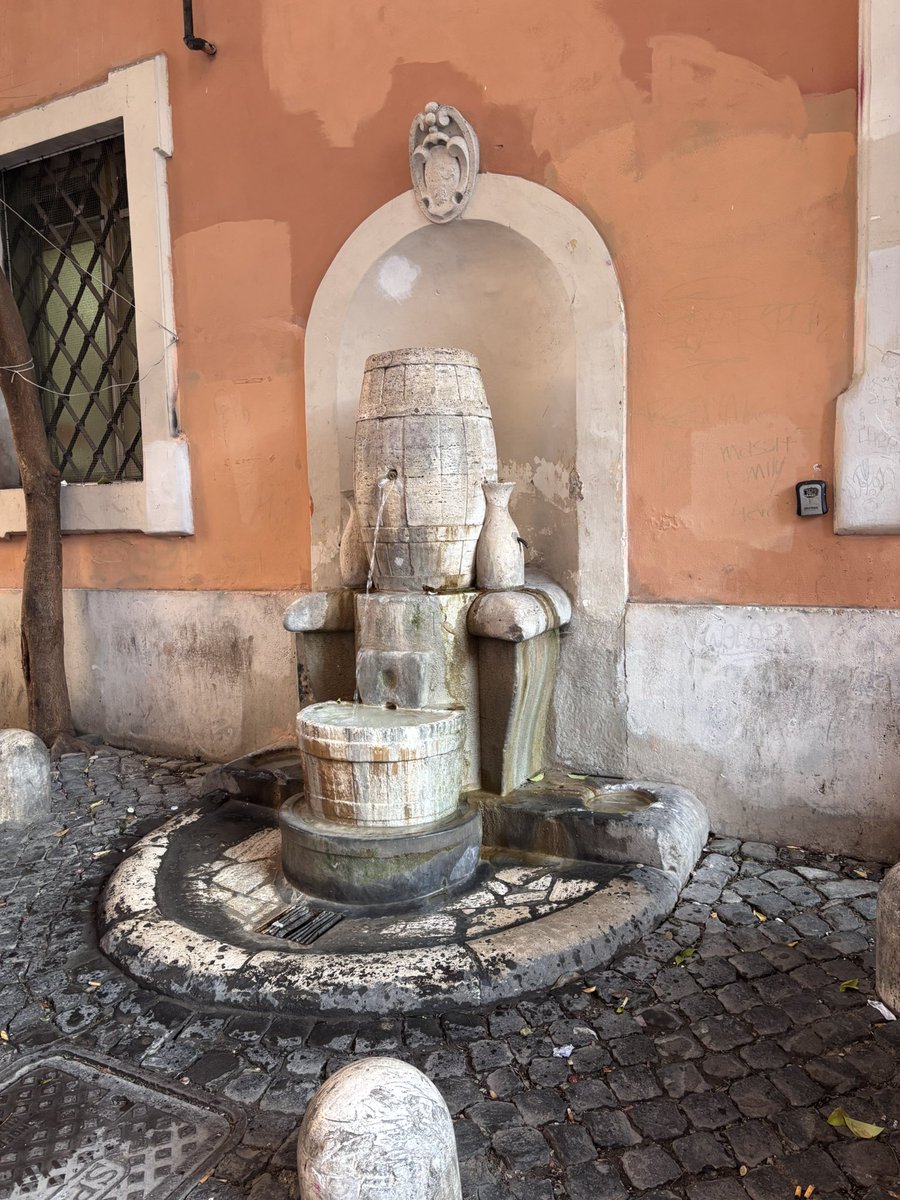 One of the fanciful water fountains in Trastevere, Rome.