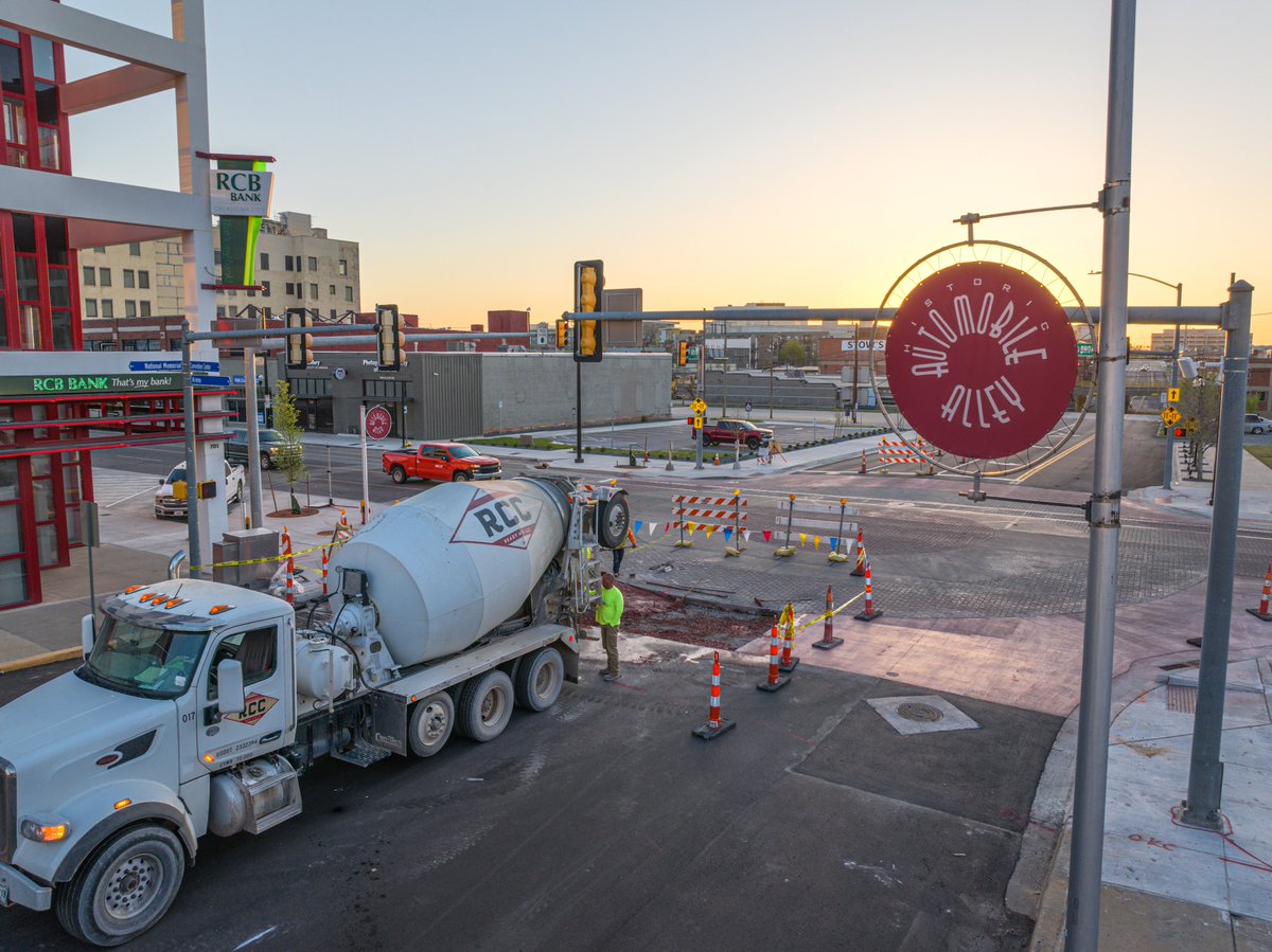 There was early morning work today in Automobile Alley. Crews poured the red-dyed concrete crosswalk at the intersection of NW 6th Street and Broadway Avenue as part of the district's ongoing streetscape project.