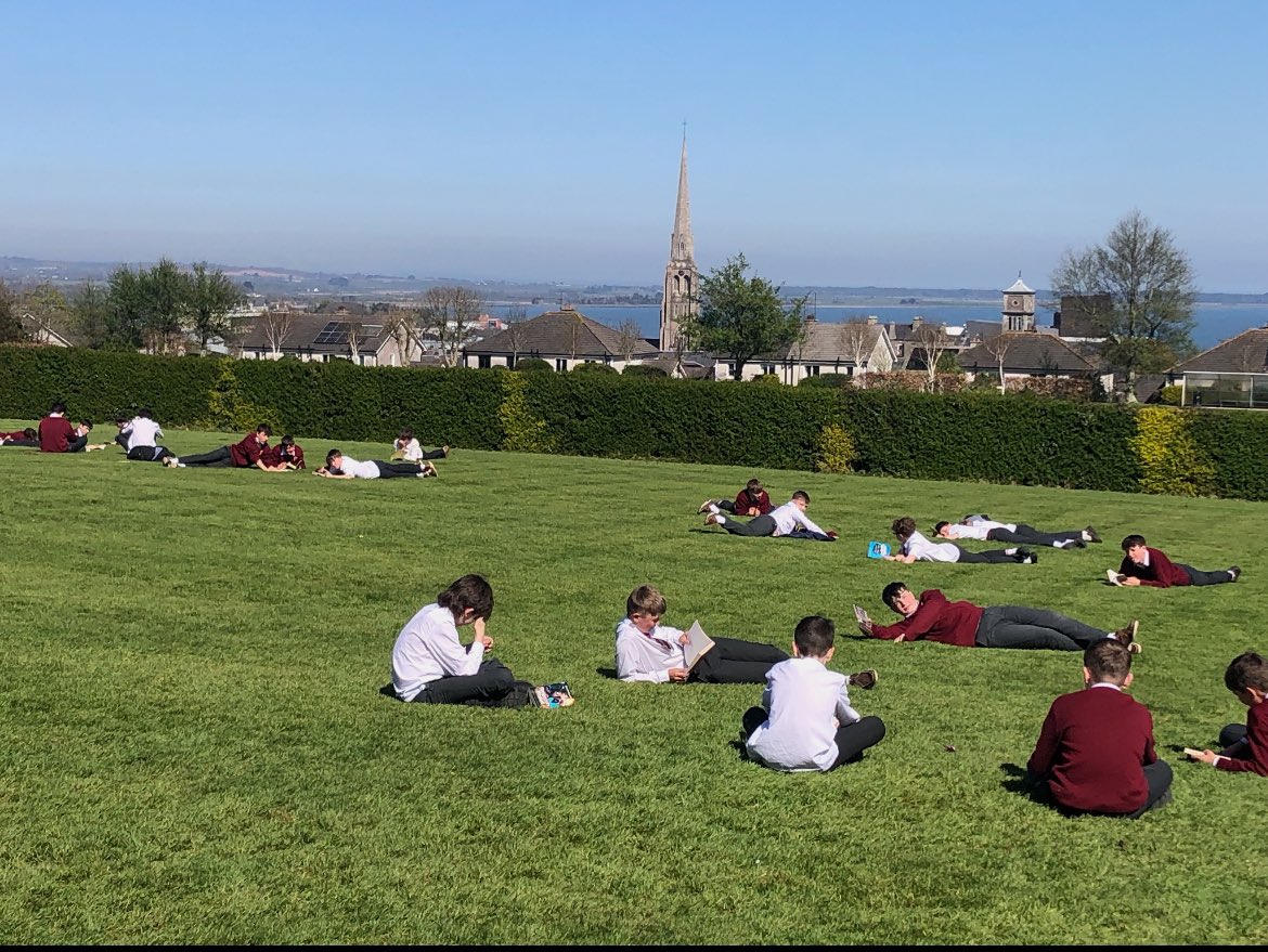 🌞📚 **National Drop Everything and Read Day** 📚🌞

Today, our students embraced the beautiful weather and celebrated National Drop Everything and Read Day in style! With a book in hand and sunshine all around, they spread out across the front lawn of the college, immersing