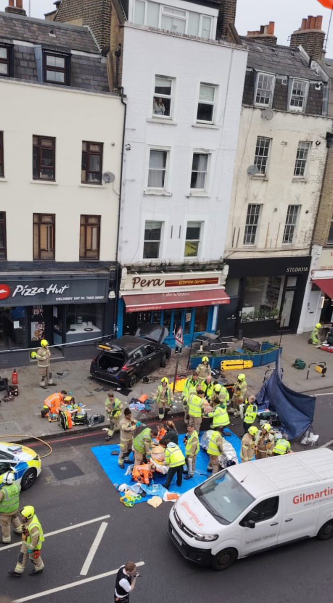 A foreigner in his 20s smashed up a cafe in Islington with his car.

4 confirmed serious injuries. Witnesses say 1 person died.