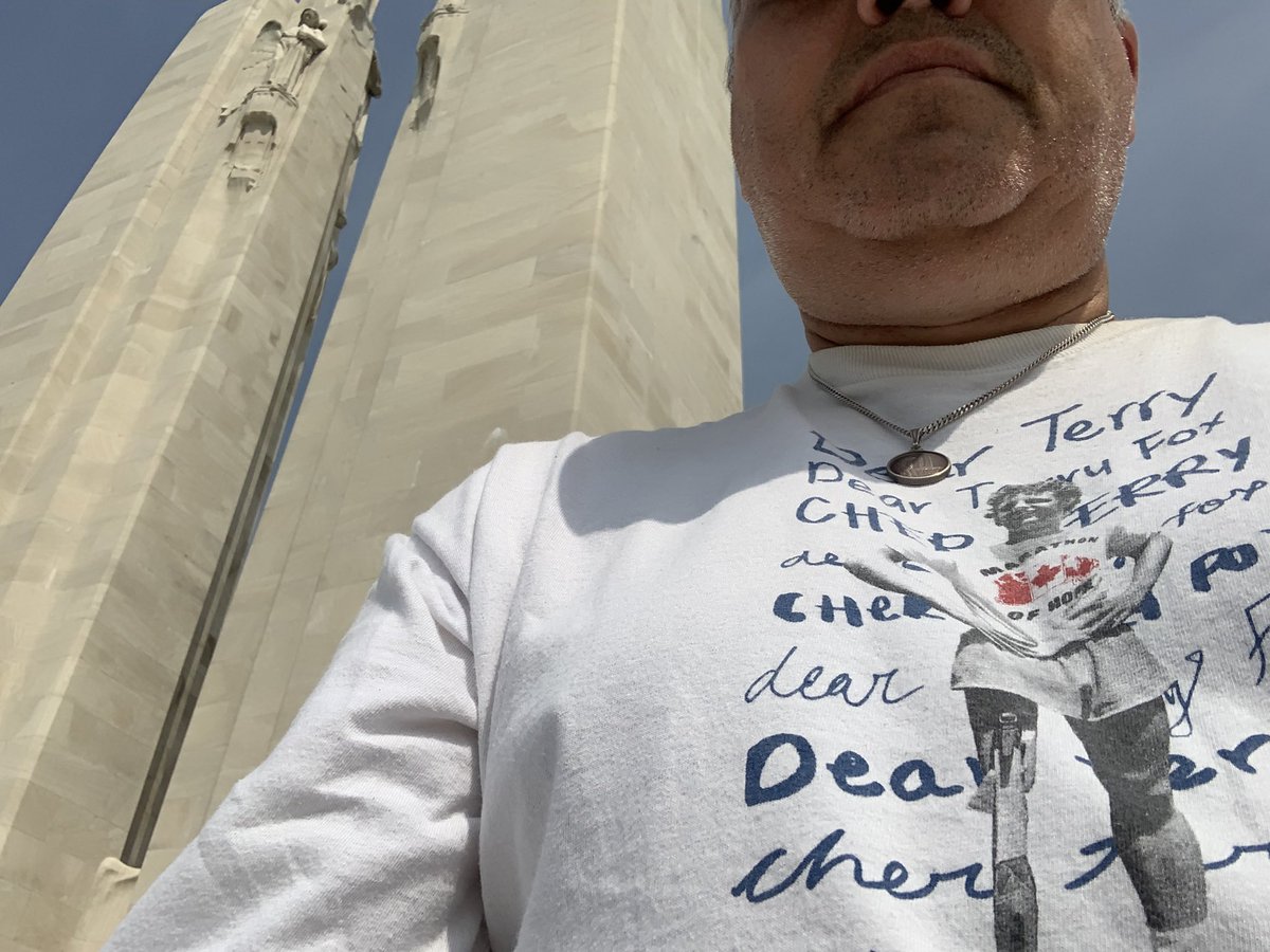 i3impossible's tweet photo. The name of Canada’s most famous hero on my shirt, standing on the monument that honours the 11285+ Canadian heroes that formed the foundation of Canadian Heroism. 🇨🇦🌺 #VimyRidge #terryfox  #canada @TerryFoxCanada @terryfoxcentre @vimyfoundation @1917Vimy #rememberthem https://t.co/5ijFay4Gc4