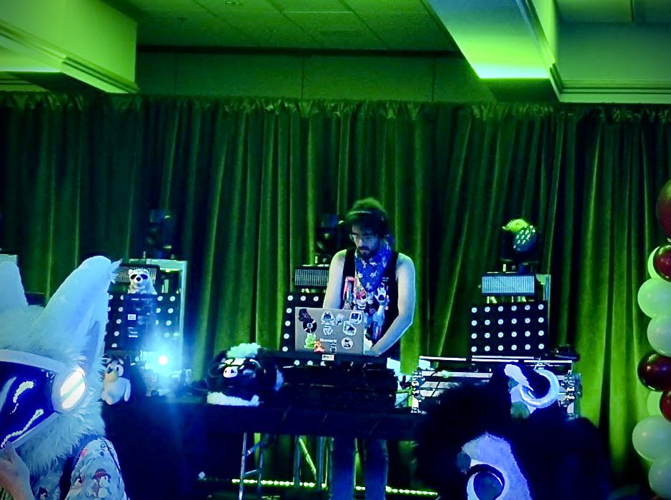 Skunkin it up last night for day 1 of #furcationland 2025!!🦨

Now onto day 2🍾….time to partake in fursuit mischief 👀

(❤️I had such a blast and every performer last night did such an incredible job!❤️ )

📸: <a href="/HeadedSeaweed/">Corolla Dragon</a> 

#furcationland #fursuiter #fursuiting #furrydj