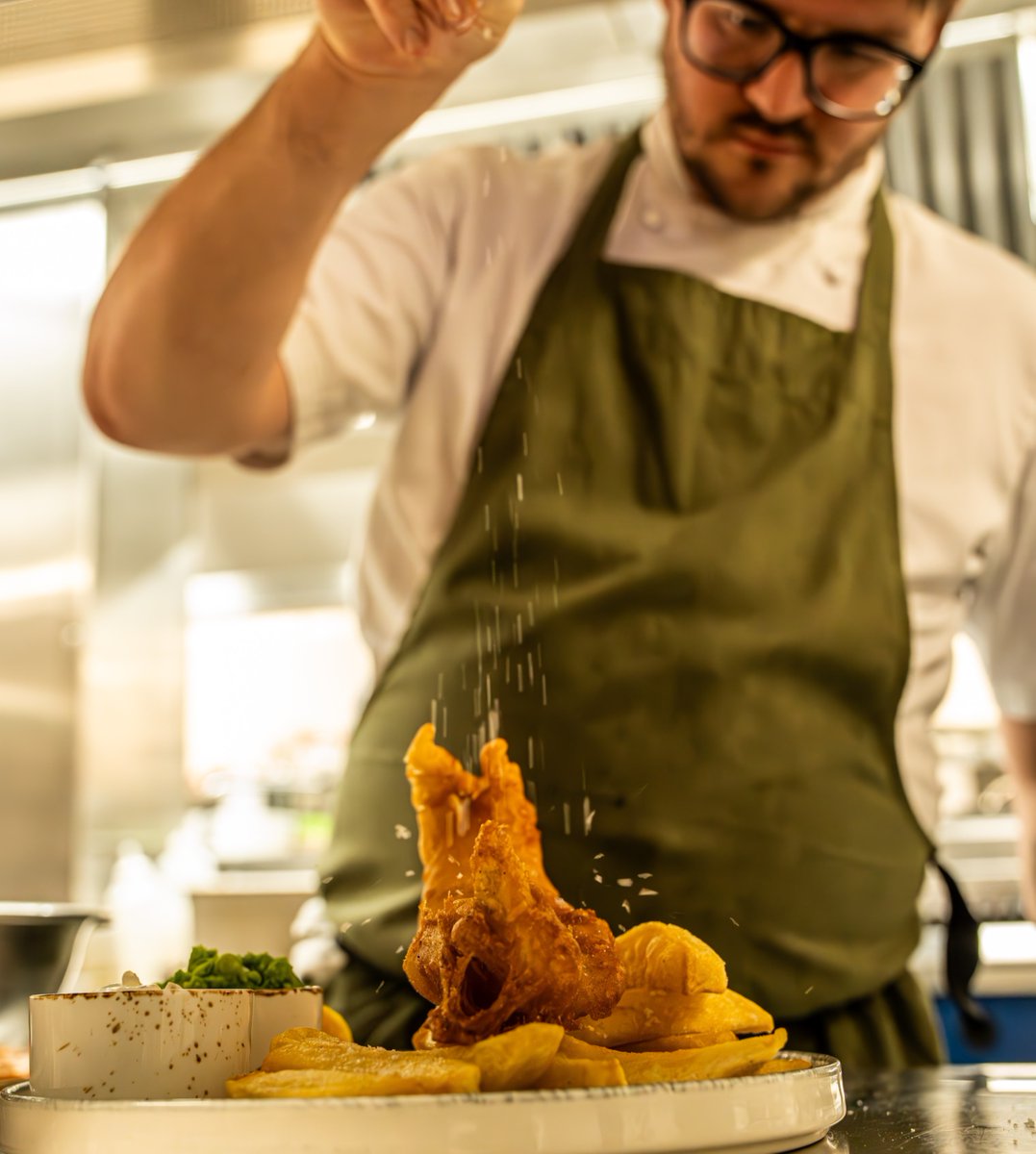 Golden, crispy, and seasoned to perfection, because fish and chips should always be this extra. 🤌✨

From the pass to your plate, every bite is a masterpiece. Who’s tucking in? 😏

#TelegraphHotel #CoventryFoodie #Foodie #FishAndChips
