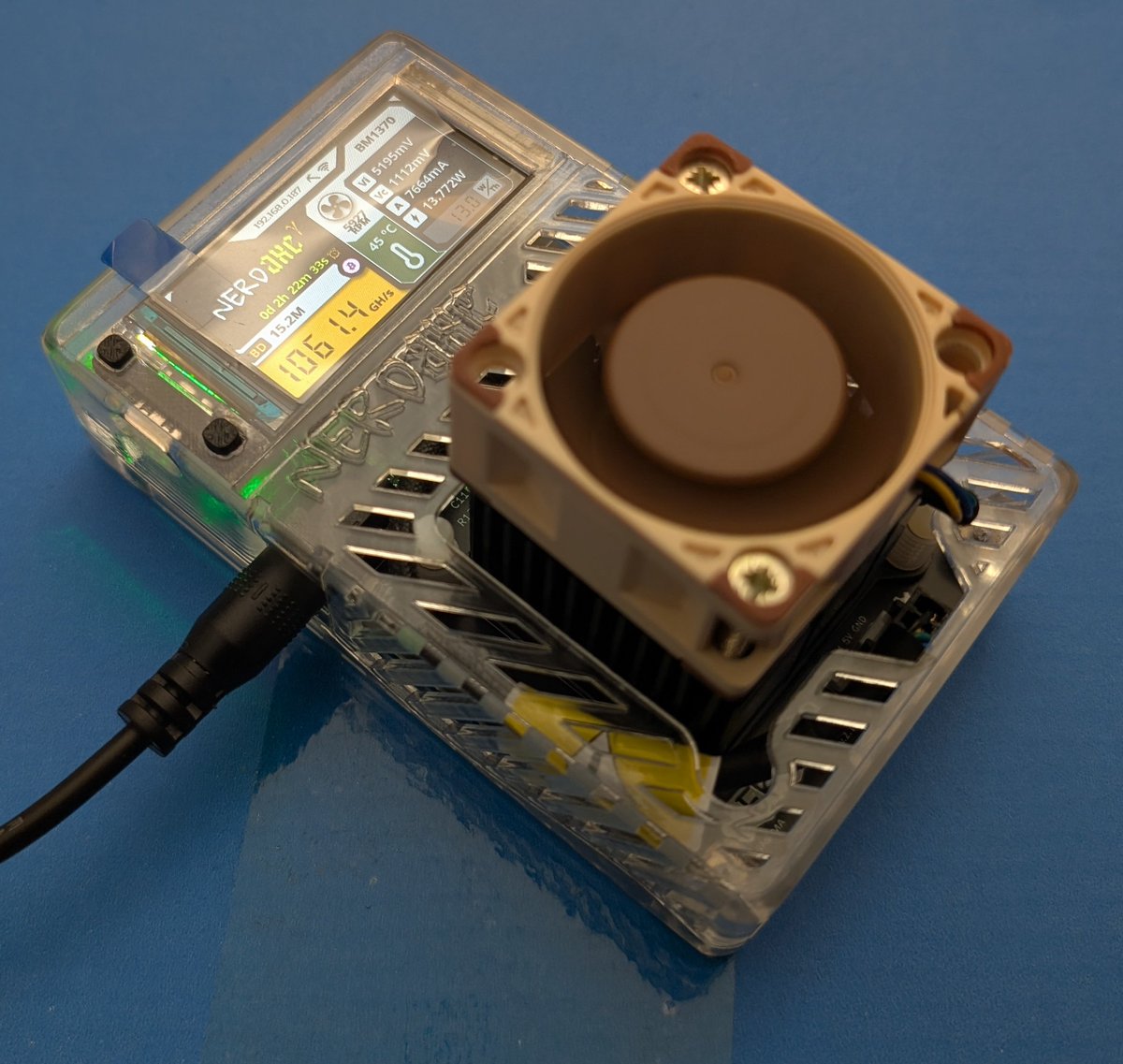 OMG it must be Christmas and my birthday on the same day! 🤯 <a href="/BitronicsStore/">₿itronics</a> <a href="/BitMaker_/">BitMaker ⚡</a> sent me a #NerdAxe Gamma in a crystal case 🤤, pimped with a Noctua fan 🤯 Thank you so much — I love these little beasts! 😍🥰