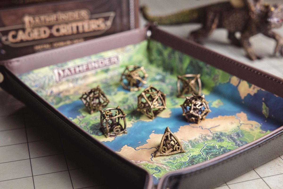 FanRollDice's tweet photo. 🧙‍♂️ Pathfinder fans, the real question is:
Would you rather trap your goblin... or cage it?

🔒 Caged Critters or Goblin Inclusion Dice – both come with a mischievous little menace sealed inside. https://t.co/PpUrA8o7N8