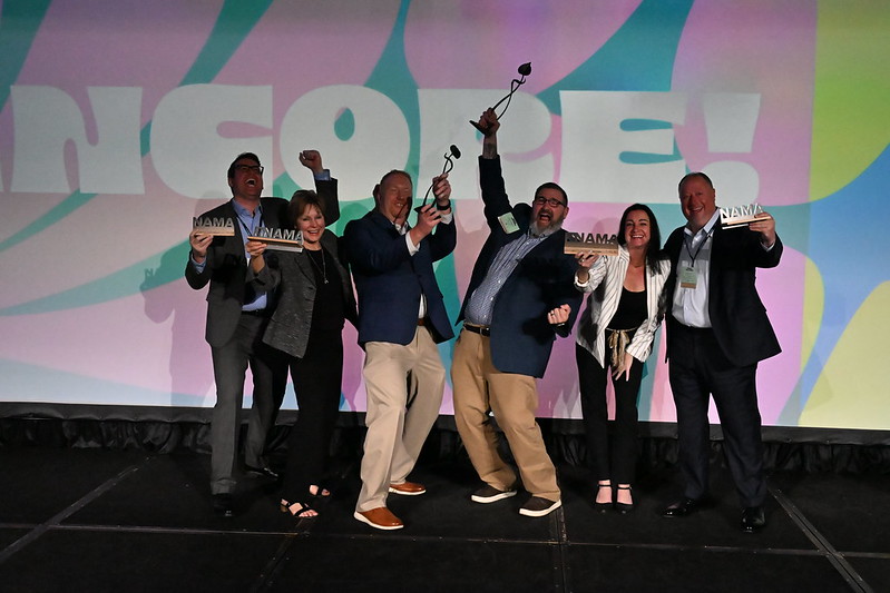 IowaPork's tweet photo. Elated 'Purchase Moore Hamann Bacon' was named Grand Champion & Best of Show at the 2025 Best of @officialNAMA Awards this week. This fun partnership with @CycloneFB student-athletes promoted pork in a positive way & provided 50,000 servings to food pantries! #cyclones #eatpork https://t.co/PSUozjtJvP