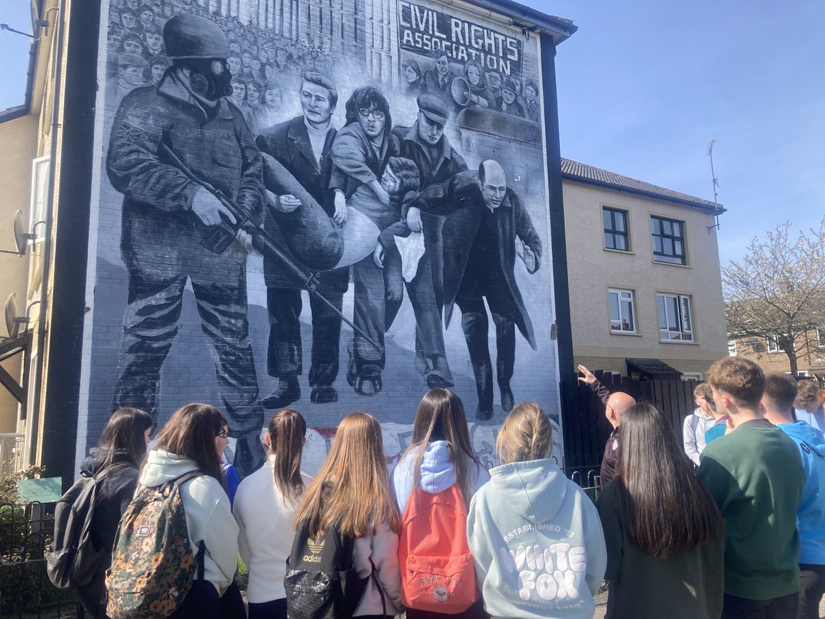 HistorySMG's tweet photo. Year 11 history students soaked up the sunshine and history in Derry today! Their trip included the Museum of Free Derry, a walking tour of the Bogside, and a stroll across the iconic Peace Bridge. https://t.co/GAnR07wzAR