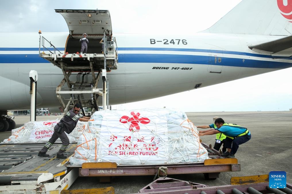 ChineseEmbinUS's tweet photo. The sixth batch of emergency humanitarian aid dispatched by the Chinese government arrived at #Yangon International Airport in #Myanmar on Friday, which includes 26 tents, 2,000 sets of single-person outdoor cooking equipment, 10,000 solar lamps, 38,880 bars of soap, 38,880 bottles of shower gel, 38,880 bottles of shampoo, 38,880 tubes of toothpaste, 38,880 sets of toothbrushes, and 38,880 bags of laundry detergent, with a total weight of over 91 tons. #chinaaid