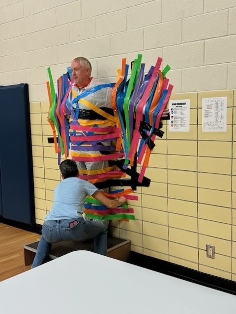 LCCMiddleSchool's tweet photo. Congratulations to our middle school who raised over $500 during our recent Middle School Coin War for our LCC PTO! The school goal was $250, and our students well exceeded expectations! For reaching their goal, students and staff had the fun of taping Mr. Leonard to the Wall! https://t.co/EpxGbC3fbk
