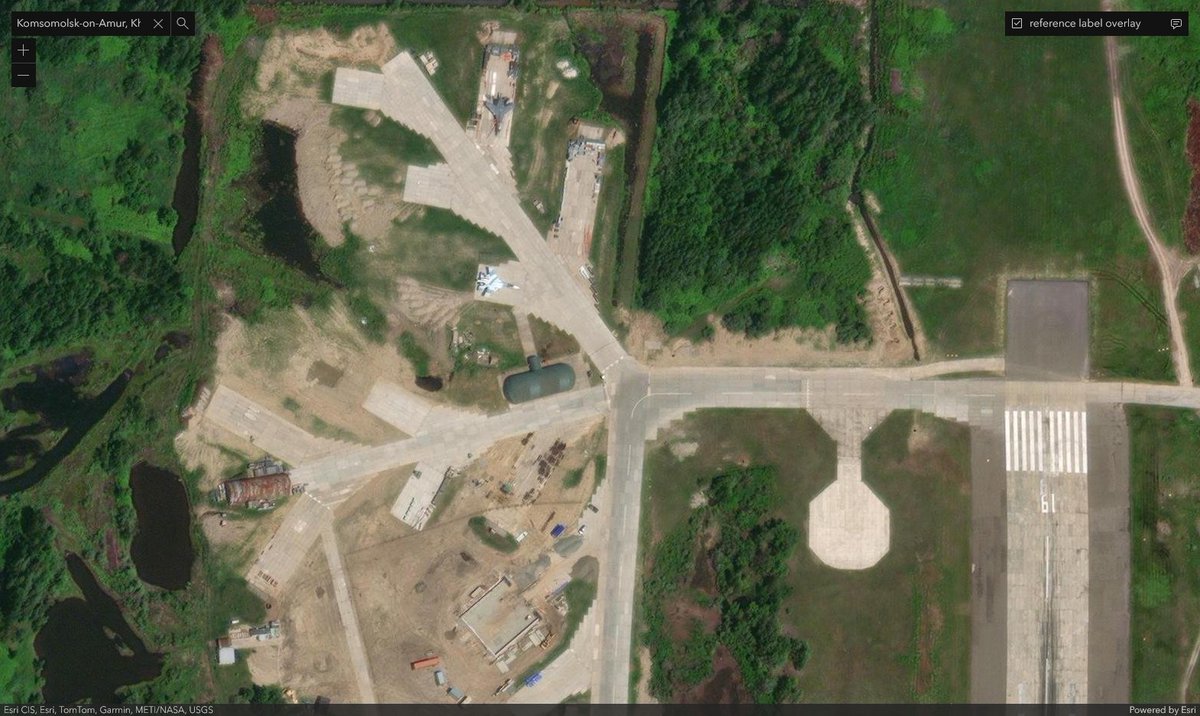 LotA_IL's tweet photo. Someone must've noticed it by now, but it's new to me - sometime between Jun-2023 and Sep-2024 ruskies painted decoy Su-35's and Su-57's over in Dzyongi air base and started raising additional protection around revetments probably reserved for Su-57. https://t.co/bkekf2qlAO