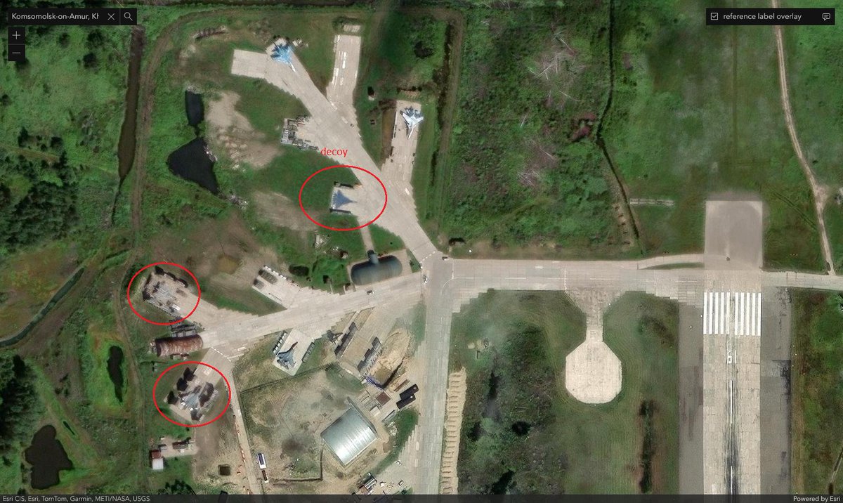 LotA_IL's tweet photo. Someone must've noticed it by now, but it's new to me - sometime between Jun-2023 and Sep-2024 ruskies painted decoy Su-35's and Su-57's over in Dzyongi air base and started raising additional protection around revetments probably reserved for Su-57. https://t.co/bkekf2qlAO
