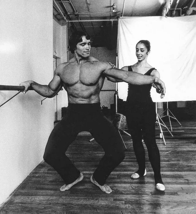 timecaptales's tweet photo. Arnold Schwarzenegger taking ballet classes to improve the grace and elegance of his body building poses, form and mobility with Marianne Claire, 1976. https://t.co/B3rII82AgS
